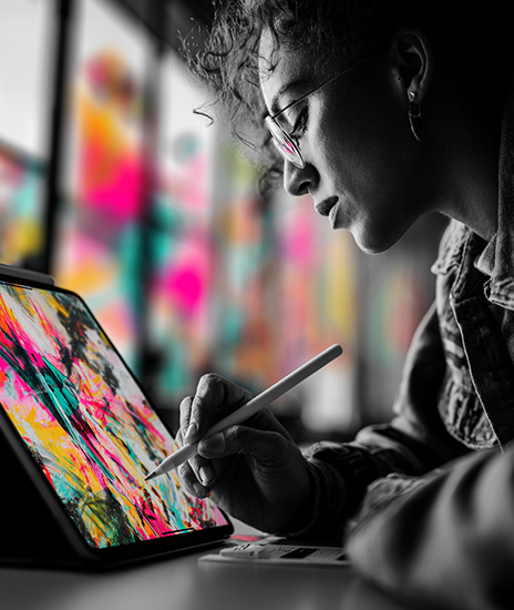 A creative using their iPad Pro 10.5 for digital art